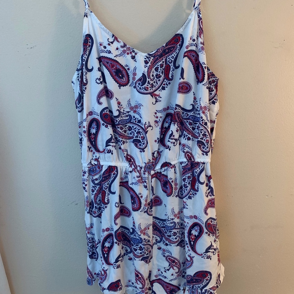 Cute little white romper with unique design
